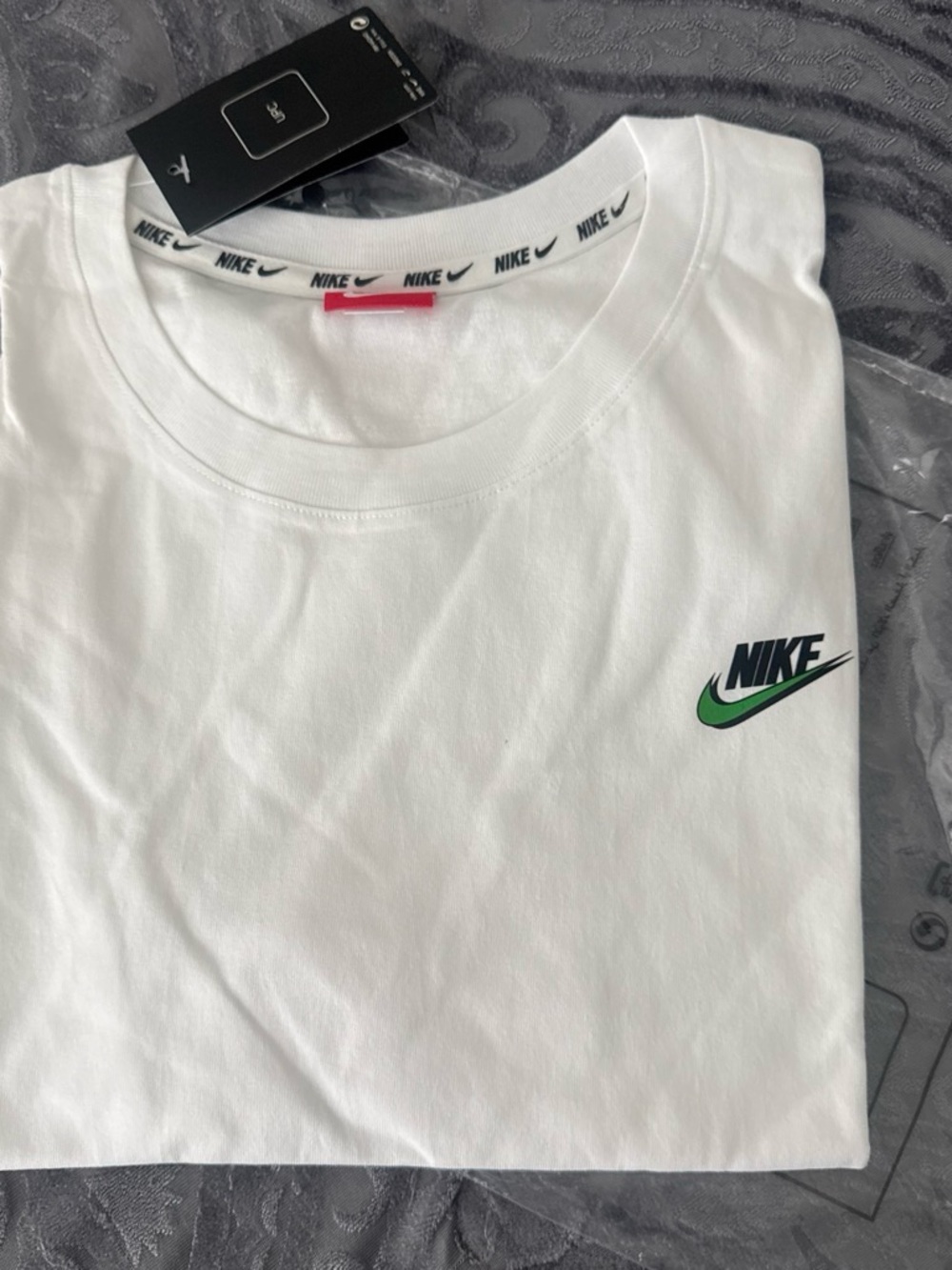 Nike Men’s White Short Sleeve Tee with Green Swoosh